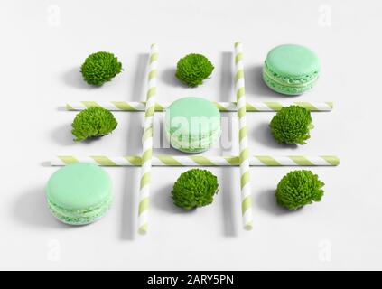 Creative composition with macarons on white background Stock Photo