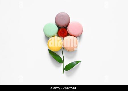 Creative composition with macarons on white background Stock Photo