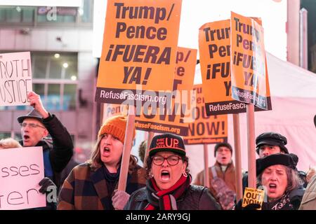 New York, New York, USA. 29th Jan, 2020. New York, New York, U.S.: demonstrators protest the GOP cover up in the impeachment trial of Donald Trump in Times Square. Credit: Corine Sciboz/ZUMA Wire/Alamy Live News Stock Photo