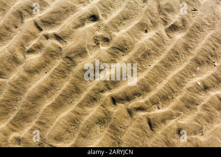 Sand ripple formation on a beach Stock Photo