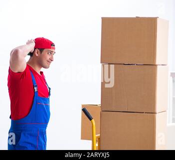 The contractor worker moving boxes during office move Stock Photo
