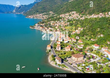 Buildings on peninsula by Lake Como in Lombardy, Italy Stock Photo