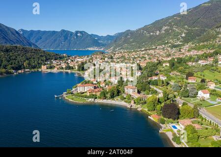 Buildings on peninsula by Lake Como in Lombardy, Italy Stock Photo