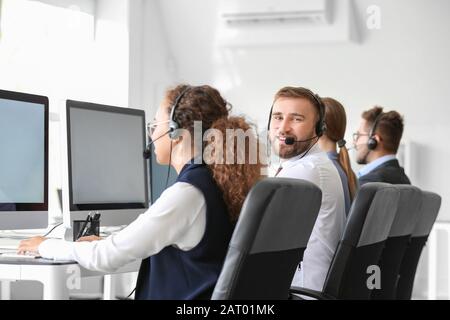 Technical support agents working in office Stock Photo