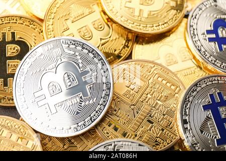 Many golden and silver bitcoins, closeup view Stock Photo