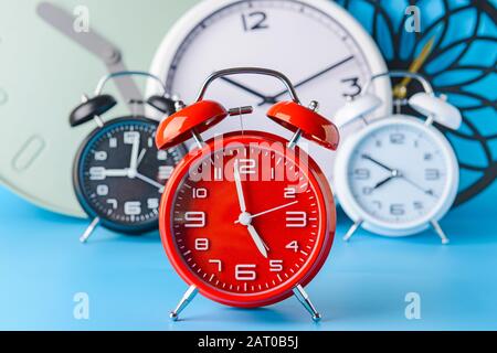 Many different clocks on table Stock Photo