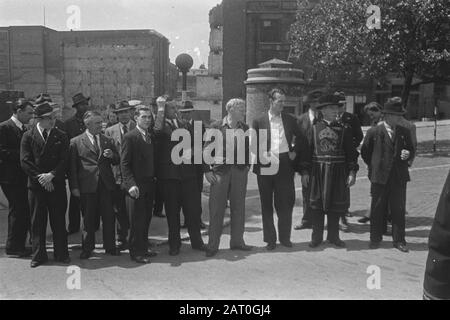 Dutch merchant seamen have been aiding the allied war effort on the seven seas. Back from their perilous journeys, a party of them recently had a day out in London. Raw salted herrings, prepared in the Dutch way and good old English beer were consumed and a good time was had by all. The party at the Tower of London Date: June 1943 Location: Great Britain, London Keywords: visits, World War II, sailors Stock Photo