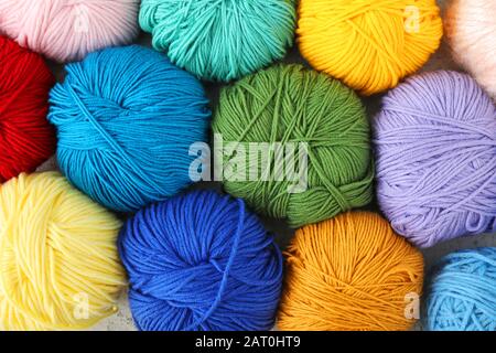 Colorful knitting yarns as background Stock Photo