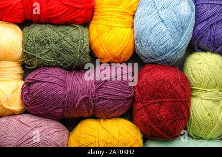 Colorful knitting yarns as background Stock Photo