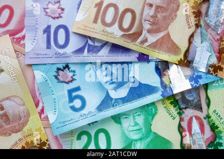 A collage of Canadian currency bills Stock Photo