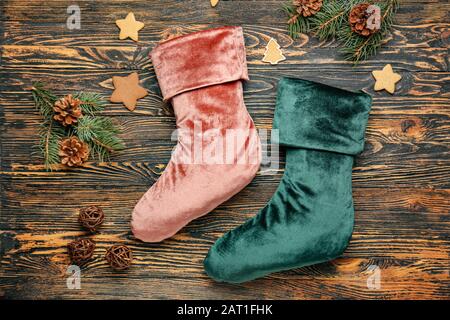 Christmas socks with decor on wooden background Stock Photo