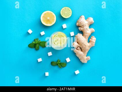 Composition with tasty ginger lemonade on color background Stock Photo
