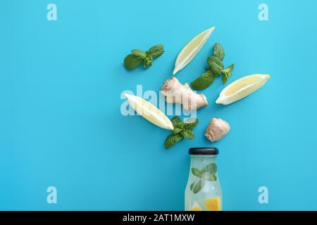 Composition with tasty ginger lemonade on color background Stock Photo