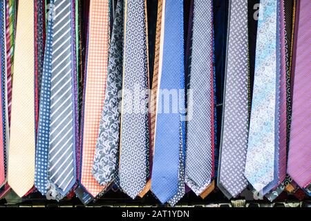 Ties in different patterns and varieties. Photographed in front of the store. Stock Photo