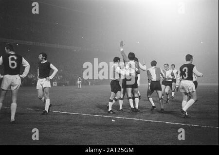 Europacup I, semi-final: Feijenoord against Legia-Warsaw, 2-0  Feijenoord players cheer after the goal (1-0) by Willem van Hanegem Date: April 15, 1970 Keywords: football Stock Photo