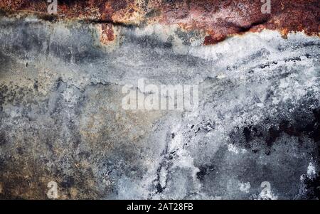 Rusty sheet surface, abstract grunge background or texture. Stock Photo