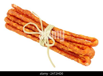 Traditional Polish dry cured Kabanos sausage isolated on a white background Stock Photo