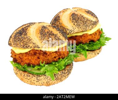 Breadcrumb covered salmon fish cake sandwich rolls isolated on a white background Stock Photo