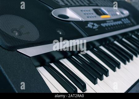 Keyboard musical electronic instrument. Keyboard synthesizer and speaker close-up Stock Photo