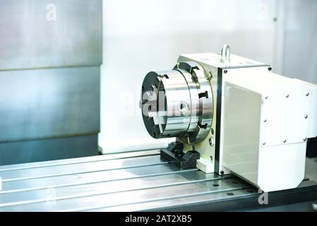 Metalworking CNC milling machine. Cutting metal modern processing technology. Stock Photo