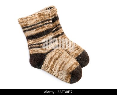 Very thick and warm hand-knitted dog wool socks Stock Photo