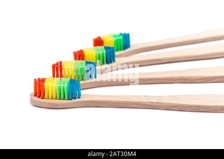 Multicolor eco bamboo toothbrushes isolated on white Stock Photo