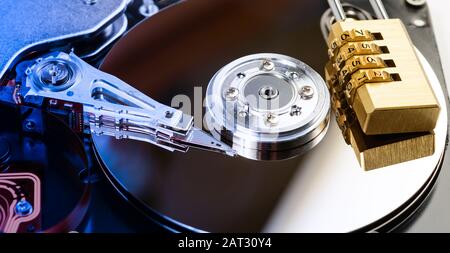 Code numbers pad lock on hard disk, security encryption concept Stock Photo