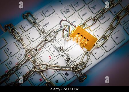 Keyboard locked in chain with padlock. Internet freedom concept Stock Photo