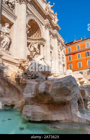 Trevi Fountain, Rome, Italy. Trevi Fountain is one of the main tourist attractions in the city. Beautiful view of Trevi Fontana in summer. Ornate baro