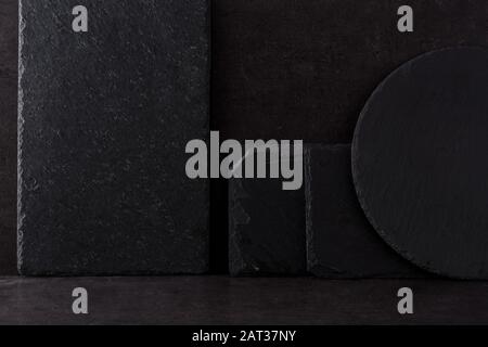 Black slate kitchenware background Stock Photo