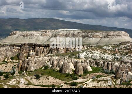 The incredible landscape including volcanic rock formations known as fairy chimneys  looking towards Pasabagi  in the Cappadocia region of Turkey. Stock Photo