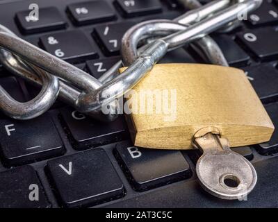 Padlock on keyboard Internet security Stock Photo