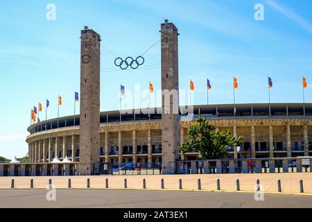 Berlin, Berlin state / Germany - 2018/07/31: Exterior of the historic Olympiastadion sports stadium originally constructed for the Summer Olympic in 1936 Stock Photo