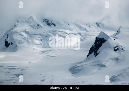 Mesmerizing glacial landscapes in the fog, Yankee Harbour, South Shetland Islands, Antarctica Stock Photo
