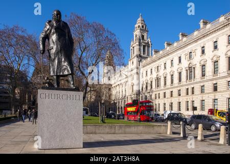London, England / United Kingdom - 2019/01/28: Sir Winston Churchill statue by Ivor Roberts-Jones at the Parliament Square in the City of Westminster quarter of Central London Stock Photo