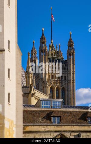 London, England / United Kingdom - 2019/01/28: Victoria Tower of the Houses of Parliament �â�� Westminster Palace seen from the royal Westminster Abbey in Central London Stock Photo