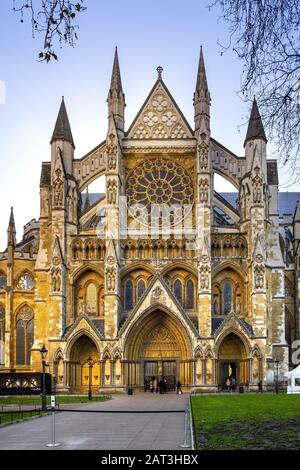 London, England / United Kingdom - 2019/01/28: Northern entrance to the royal Westminster Abbey, formally Collegiate Church of St. Peter at Westminster at the Dean�â��s Yard in Central London Stock Photo