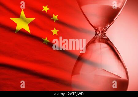 Sand running through an hourglass on flag of China