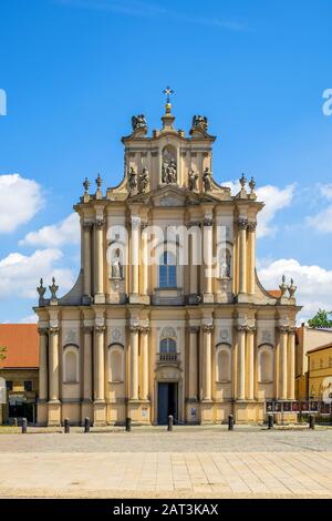 Warsaw, Mazovia / Poland - 2019/06/01: Front view of the rococo Visitationist St. Joseph Church �â�� known as Kosciol Wizytek - at the Krakowskie Przedmiescie street in the Old Town quarter of Warsaw Stock Photo