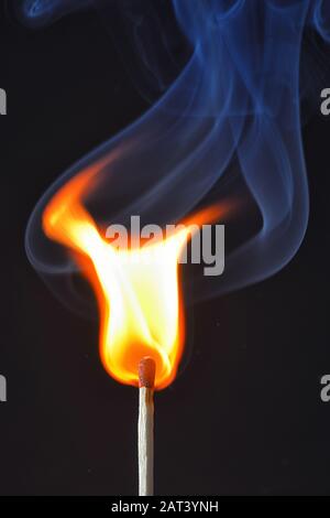 Macro Photo Of Burning Matches On Black Background Stock Photo