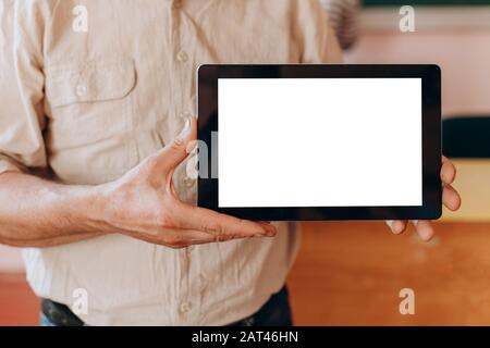 Blank white screen mockup in make hands . - Image Stock Photo
