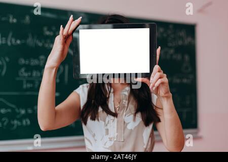 Woman holding a blank screen white mockup .- Image Stock Photo