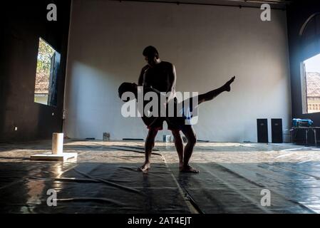 Battambang, Cambodia, Asia: two actors from the Phare Ponleu Selpak Circus rehearses the performance of the evening show Stock Photo