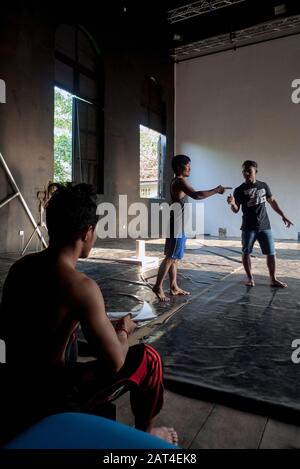 Battambang, Cambodia, Asia: two actors from the Phare Ponleu Selpak Circus rehearses the performance of the evening show Stock Photo