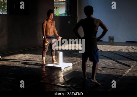 Battambang, Cambodia, Asia: two actors from the Phare Ponleu Selpak Circus rehearses the performance of the evening show Stock Photo