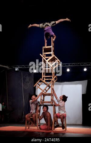 Battambang, Cambodia, Asia: a group of acrobats from the Phare Ponleu Selpak Circus during a performance in the evening show Stock Photo