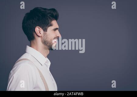 Close-up profile side view portrait of his he nice attractive professional experienced cheerful brunette guy agent broker expert financier marketer Stock Photo