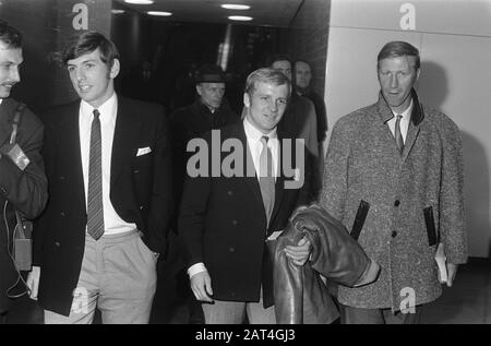 English football team arrives at Schiphol for the match against the Dutch team next Wednesday. Number two Martin Peters? , Jackie Charlton; Stock Photo