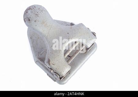 vintage tool for piercing holes in paper ( punch ) isolated on a white background Stock Photo