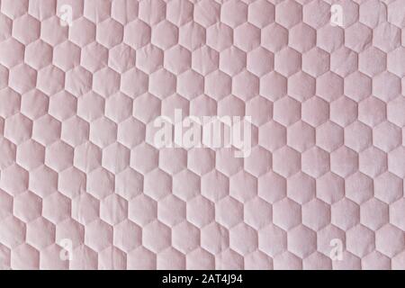Pink color hexagon mesh fabric textured background Stock Photo